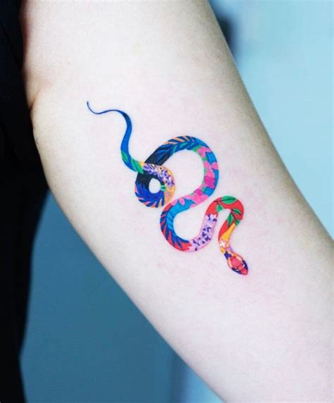 small snake tattoos for women.